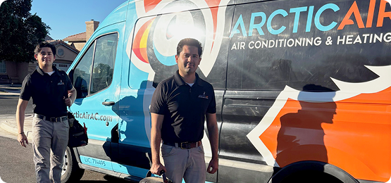 a company work van with two employees in the foreground